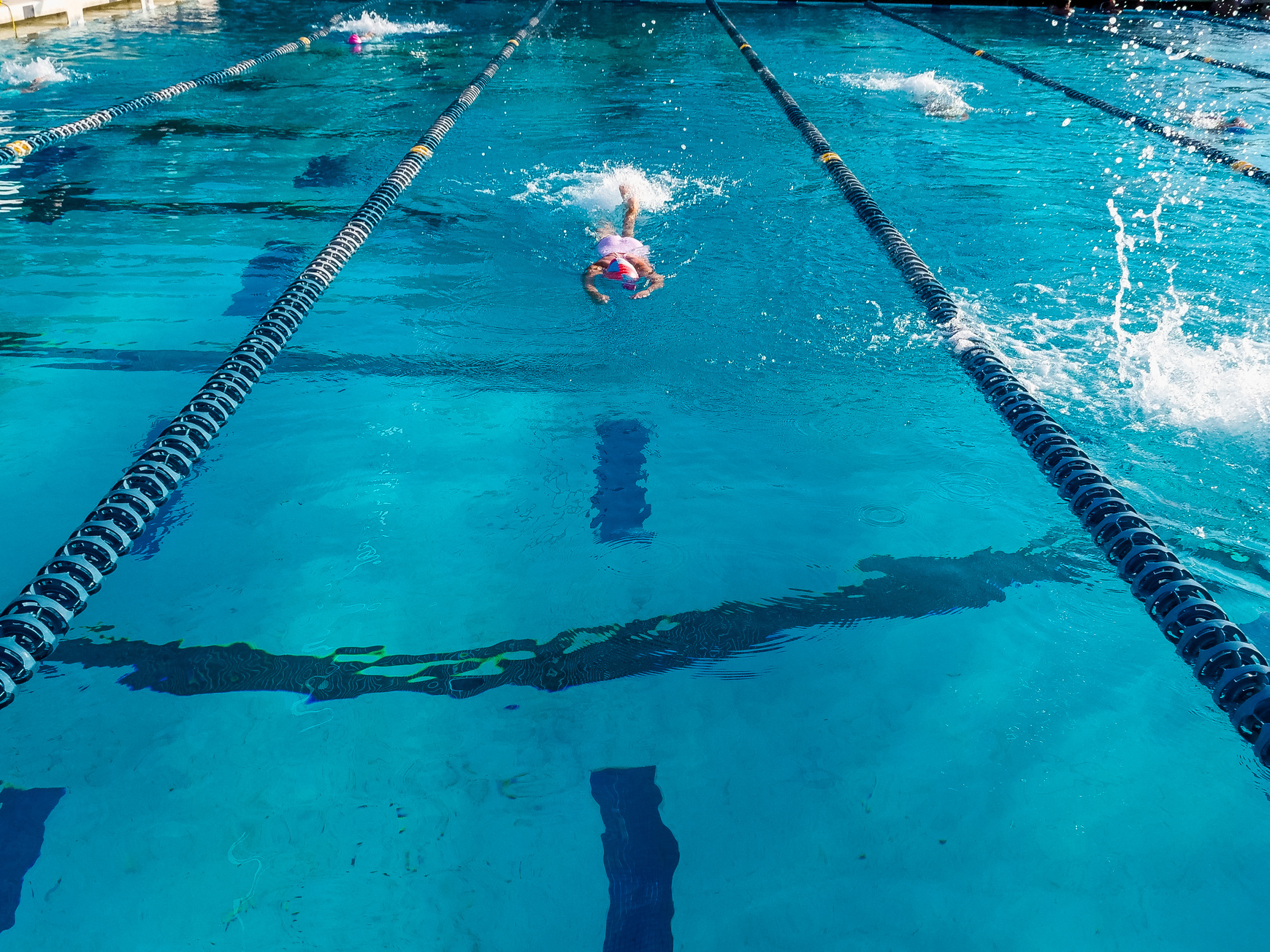 A Person Swimming in the Pool